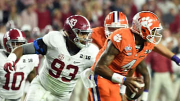 Jan 11, 2016; Glendale, AZ, USA; Clemson Tigers quarterback Deshaun Watson (4) is pressured by Alabama Crimson Tide defensive lineman Jonathan Allen (93) in the first quarter in the 2016 CFP National Championship at University of Phoenix Stadium. Mandatory Credit: Matt Kartozian-USA TODAY Sports