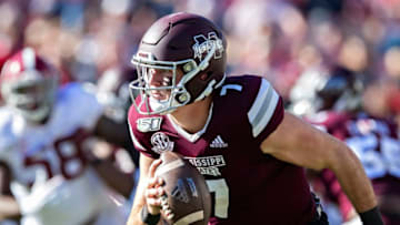 FAYETTEVILLE, AR - NOVEMBER 9: Tommy Stevens #7 of the Mississippi State Bulldogs rolls out to avoid the rush during a game against the Alabama Crimson Tide at Davis Wade Stadium on November 16, 2019 in Starkville, Mississippi. The Crimson Tide defeated the Bulldogs 38-7. (Photo by Wesley Hitt/Getty Images)