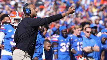 Auburn footballFlorida Gators interim defensive coordinator Christian Robinson yells to his players during a game against Florida State University at Ben Hill Griffin Stadium in Gainesville Fla., Nov. 27, 2021.Flagi 112721 Ufvfsu Fans 12