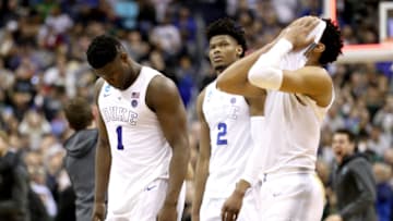 WASHINGTON, DC - MARCH 31: (L-R) Zion Williamson #1, Cam Reddish #2 and Tre Jones #3 of the Duke Blue Devils react after their teams 68-67 loss to the Michigan State Spartans in the East Regional game of the 2019 NCAA Men's Basketball Tournament at Capital One Arena on March 31, 2019 in Washington, DC. (Photo by Patrick Smith/Getty Images)
