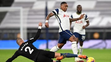 Manchester City's English defender Kyle Walker (L) vies with Tottenham Hotspur's Steven Bergwijn, on November 21, 2020. (Photo by NEIL HALL/POOL/AFP via Getty Images)