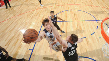 LAS VEGAS, NV - JULY 13: Ding Yanyuhang #8 of the Dallas Mavericks shoots the ball against the Sacramento Kings on July 13, 2017 at the Thomas & Mack Center in Las Vegas, Nevada. NOTE TO USER: User expressly acknowledges and agrees that, by downloading and/or using this Photograph, user is consenting to the terms and conditions of the Getty Images License Agreement. Mandatory Copyright Notice: Copyright 2017 NBAE (Photo by Garrett Ellwood/NBAE via Getty Images)