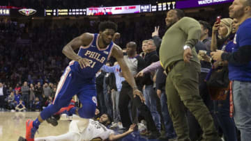 PHILADELPHIA, PA - NOVEMBER 21: Anthony Davis #23 of the New Orleans Pelicans shoots the ball and is fouled by Joel Embiid #21 of the Philadelphia 76ers in the final seconds of the fourth quarter at the Wells Fargo Center on November 21, 2018 in Philadelphia, Pennsylvania. NOTE TO USER: User expressly acknowledges and agrees that, by downloading and or using this photograph, User is consenting to the terms and conditions of the Getty Images License Agreement. (Photo by Mitchell Leff/Getty Images)