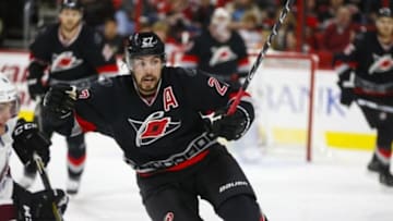 Oct 30, 2015; Raleigh, NC, USA; Carolina Hurricanes defensemen Justin Faulk (27) skates on the ice against the Colorado Avalanche at PNC Arena. The Hurricanes won 3-2. Mandatory Credit: James Guillory-USA TODAY Sports