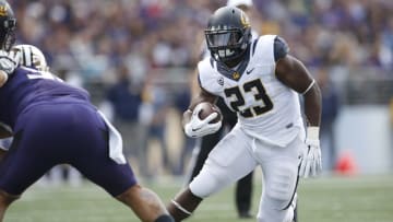 Sep 26, 2015; Seattle, WA, USA; California Golden Bears running back Vic Enwere (23) rushes the ball against the Washington Huskies during the first quarter at Husky Stadium. Mandatory Credit: Jennifer Buchanan-USA TODAY Sports