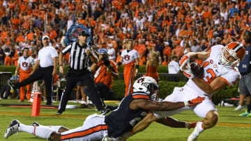 Sep 3, 2016; Auburn, AL, USA; Clemson Tigers wide receiver Hunter Renfrow (13) scores a touchdown ahead of Auburn Tigers defensive back Johnathan Ford (23) during the fourth quarter at Jordan Hare Stadium. Mandatory Credit: Shanna Lockwood-USA TODAY Sports
