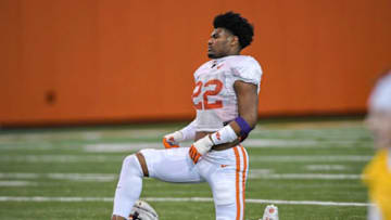 Clemson linebacker Trenton Simpson(22) stretches during football practice in Clemson, S.C. Monday, March 8, 2021.Clemson Spring Football Practice March 8