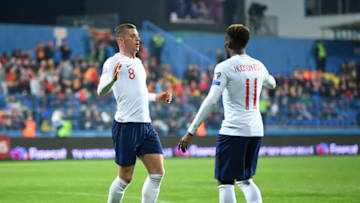 PODGORICA, MONTENEGRO - MARCH 25: Ross Barkley of England celebrates after scoring his team's third goal with Callum Hudson-Odoi during the 2020 UEFA European Championships Group A qualifying match between Montenegro and England at Podgorica City Stadium on March 25, 2019 in Podgorica, Montenegro. (Photo by Michael Regan/Getty Images)