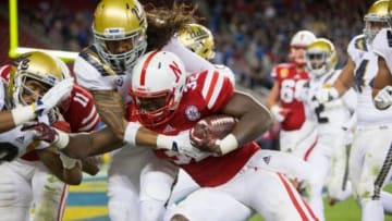 Dec 26, 2015; Santa Clara, CA, USA; Nebraska Cornhuskers running back Imani Cross (32) runs the ball against the UCLA Bruins in the 2nd quarter at Levi