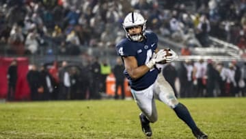 STATE COLLEGE, PA - NOVEMBER 24: Ricky Slade #4 of the Penn State Nittany Lions scores a touchdown against the Maryland Terrapins during the second half at Beaver Stadium on November 24, 2018 in State College, Pennsylvania. (Photo by Scott Taetsch/Getty Images)