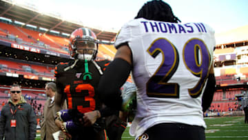 CLEVELAND, OH - DECEMBER 22: Odell Beckham Jr. #13 of the Cleveland Browns trades cleats with Earl Thomas III #29 of the Baltimore Ravens after the game at FirstEnergy Stadium on December 22, 2019 in Cleveland, Ohio. Baltimore defeated Cleveland 31-15. (Photo by Kirk Irwin/Getty Images)