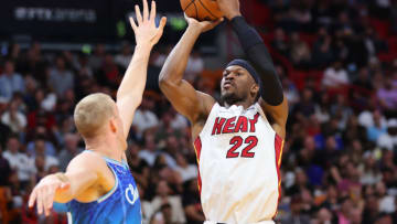 Jimmy Butler #22 of the Miami Heat shoots over Mason Plumlee #24 of the Charlotte Hornets(Photo by Michael Reaves/Getty Images)