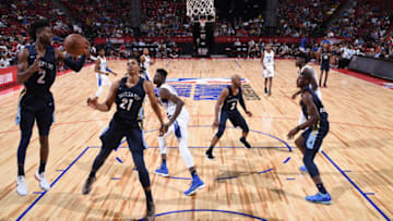 LAS VEGAS, NV - JULY 8: Kobi Simmons #2 of the Memphis Grizzlies grabs the rebound against the Orlando Magic during the 2018 Las Vegas Summer League on July 8, 2018 at the Thomas & Mack Center in Las Vegas, Nevada. NOTE TO USER: User expressly acknowledges and agrees that, by downloading and/or using this Photograph, user is consenting to the terms and conditions of the Getty Images License Agreement. Mandatory Copyright Notice: Copyright 2018 NBAE (Photo by Garrett Ellwood/NBAE via Getty Images)