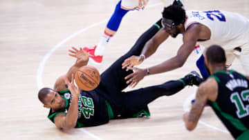 PHILADELPHIA, PA - MAY 07: Boston Celtics Center Al Horford (42) makes a pass to Boston Celtics Forward Marcus Morris (13) from the ground beyond the reach of Philadelphia 76ers Center Joel Embiid (21) in the second half during the Eastern Conference Semifinal Game between the Boston Celtics and Philadelphia 76ers on May 07, 2018 at Wells Fargo Center in Philadelphia, PA. (Photo by Kyle Ross/Icon Sportswire via Getty Images)