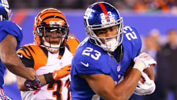 Nov 14, 2016; East Rutherford, NJ, USA; New York Giants running back Rashad Jennings (23) runs with the ball during the second half at MetLife Stadium. The Giants defeated the Bengals 21-20. Mandatory Credit: Ed Mulholland-USA TODAY Sports