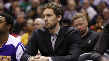 Apr 16, 2014; San Antonio, TX, USA; Los Angeles Lakers center Pau Gasol (16) watches from the bench against the San Antonio Spurs during the second half at AT&T Center. The Lakers won 113-100. Mandatory Credit: Soobum Im-USA TODAY Sports