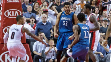 Apr 9, 2016; Portland, OR, USA; Minnesota Timberwolves center Karl-Anthony Towns (32) reacts after making the game winning shot against the Portland Trail Blazers during the fourth quarter at the Moda Center. The Timberwolves won 106-105. Mandatory Credit: Craig Mitchelldyer-USA TODAY Sports