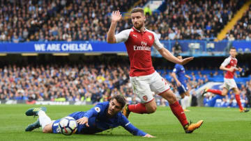 LONDON, ENGLAND - SEPTEMBER 17: Alvaro Morata of Chelsea and Shkodran Mustafi of Arsenal battle for possession during the Premier League match between Chelsea and Arsenal at Stamford Bridge on September 17, 2017 in London, England. (Photo by Mike Hewitt/Getty Images)