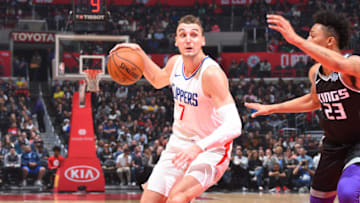 LOS ANGELES, CA - DECEMBER 26: Sam Dekker #7 of the LA Clippers handles the ball against the Sacramento Kings on December 26, 2017 at STAPLES Center in Los Angeles, California. NOTE TO USER: User expressly acknowledges and agrees that, by downloading and/or using this Photograph, user is consenting to the terms and conditions of the Getty Images License Agreement. Mandatory Copyright Notice: Copyright 2017 NBAE (Photo by Andrew D. Bernstein/NBAE via Getty Images)