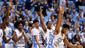 CHAPEL HILL, NORTH CAROLINA - NOVEMBER 19: The bench reacts after a three-point basket by K.J. Smith #30 of the North Carolina Tar Heels during the second half of their game against the St. Francis Red Flash at the Dean Smith Center on November 19, 2018 in Chapel Hill, North Carolina. North Carolina won 101-76. (Photo by Grant Halverson/Getty Images)