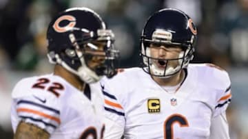 Dec 22, 2013; Philadelphia, PA, USA; Chicago Bears quarterback Jay Cutler (6) talks with running back Matt Forte (22) during the second quarter against the Philadelphia Eagles at Lincoln Financial Field. Mandatory Credit: Howard Smith-USA TODAY Sports