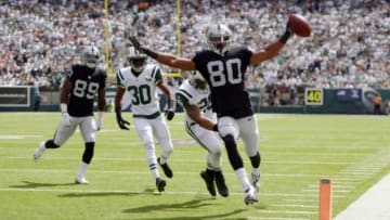 Sep 7, 2014; East Rutherford, NJ, USA; Oakland Raiders receiver Rod Streater (80) celebrates after scoring on a 12-yard touchdown reception in the first quarter against the New York Jets at MetLife Stadium. Mandatory Credit: Kirby Lee-USA TODAY Sports