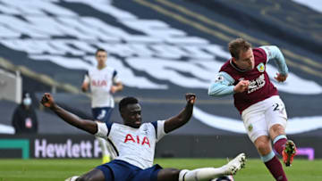Burnley's Czech striker Matej Vydra (R) has this shot blocked by Tottenham Hotspur's Colombian defender Davinson Sanchez (L) during the English Premier League football match between Tottenham Hotspur and Burnley at Tottenham Hotspur Stadium in London, on February 28, 2021. (Photo by DANIEL LEAL-OLIVAS/POOL/AFP via Getty Images)