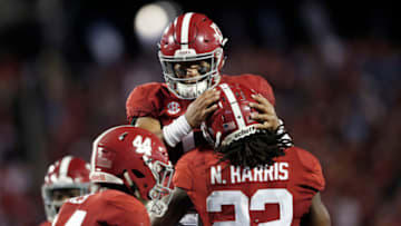 ORLANDO, FL - SEPTEMBER 01: Tua Tagovailoa #13 of the Alabama Crimson Tide celebrates with Najee Harris #22 after his one-yard touchdown run in the second quarter of the game against the Louisville Cardinals at Camping World Stadium on September 1, 2018 in Orlando, Florida. (Photo by Joe Robbins/Getty Images)