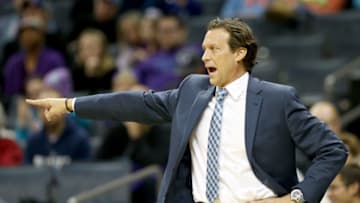 CHARLOTTE, NC - JANUARY 18: Head coach Quin Snyder of the Utah Jazz points to his team during their game against the Charlotte Hornets at Time Warner Cable Arena on January 18, 2016 in Charlotte, North Carolina. NOTE TO USER: User expressly acknowledges and agrees that, by downloading and or using this photograph, User is consenting to the terms and conditions of the Getty Images License Agreement. (Photo by Streeter Lecka/Getty Images)