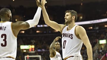 Nov 23, 2016; Cleveland, OH, USA; Cleveland Cavaliers forward LeBron James (23), guard Iman Shumpert (4) and forward Kevin Love (0) celebrate in the fourth quarter against the Portland Trail Blazers at Quicken Loans Arena. Mandatory Credit: David Richard-USA TODAY Sports