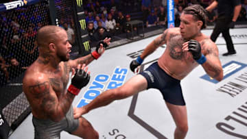 LAS VEGAS, NEVADA - AUGUST 13: (R-L) Brok Weaver kicks Devin Smyth in their welterweight bout during Dana White's Contender Series week 8 at the UFC Apex on August 13, 2019 in Las Vegas, Nevada. (Photo by Chris Unger/DWCS LLC/Zuffa LLC)