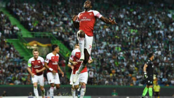 LISBON, PORTUGAL - OCTOBER 25: Danny Welbeck of Arsenal celebrates with team mates after scoring his sides first goal during the UEFA Europa League Group E match between Sporting CP and Arsenal at Estadio Jose Alvalade on October 25, 2018 in Lisbon, Portugal. (Photo by David Ramos/Getty Images)