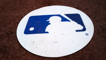 DUNEDIN, FLORIDA - FEBRUARY 27: MLB Logo on the batting mat during the spring training game between the Toronto Blue Jays and the Minnesota Twins at TD Ballpark on February 27, 2020 in Dunedin, Florida. (Photo by Mark Brown/Getty Images)