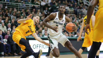 EAST LANSING, MI - DECEMBER 21: Jaren Jackson Jr. #2 of the Michigan State Spartans drives to the basket against Gabe Levin #0 of the Long Beach State 49ers at Breslin Center on December 21, 2017 in East Lansing, Michigan. (Photo by Rey Del Rio/Getty Images)
