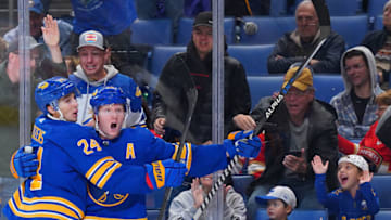 BUFFALO, NY - OCTOBER 15: Rasmus Dahlin #26 of the Buffalo Sabres celebrates his goal with Dylan Cozens #24 during the game against the Florida Panthers at KeyBank Center on October 15, 2022 in Buffalo, New York. (Photo by Kevin Hoffman/Getty Images)