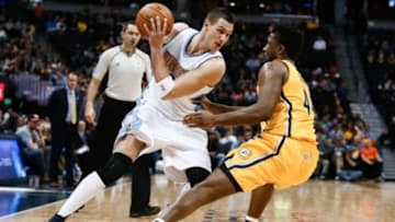 Jan 17, 2016; Denver, CO, USA; Denver Nuggets forward Danilo Gallinari (8) controls the ball against Indiana Pacers forward Solomon Hill (44) in the fourth quarter at the Pepsi Center. The Nuggets defeated the Pacers 129-126. Mandatory Credit: Isaiah J. Downing-USA TODAY Sports