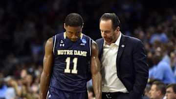 Mar 27, 2016; Philadelphia, PA, USA; Notre Dame Fighting Irish head coach Mike Brey reacts with guard Demetrius Jackson (11) after losing to the North Carolina Tar Heels in the championship game in the East regional of the NCAA Tournament at Wells Fargo Center. Carolina won 88-74. Mandatory Credit: Bob Donnan-USA TODAY Sports