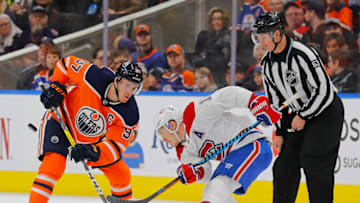 Dec 23, 2017; Edmonton, Alberta, CAN; Edmonton Oilers forward Connor McDavid (97) and Montreal Canadiens forward Brendan Gallagher (11) face off during the third period at Rogers Place. Mandatory Credit: Perry Nelson-USA TODAY Sports