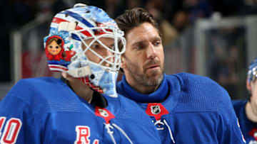 NEW YORK, NY - MARCH 25: Henrik Lundqvist #30 and Alexandar Georgiev #40 of the New York Rangers head off the ice after the third period against the Pittsburgh Penguins at Madison Square Garden on March 25, 2019 in New York City. The Pittsburgh Penguins won 5-2. (Photo by Jared Silber/NHLI via Getty Images)