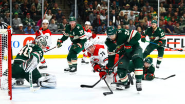 ST. PAUL, MN - OCTOBER 13: Carolina Hurricanes left wing Micheal Ferland (79), tries to corral a puck while Minnesota Wild defenseman Matt Dumba (24) defends during the regular season game between the Carolina Hurricanes and the Minnesota Wild on October 13, 2018 at Xcel Energy Center in St. Paul, Minnesota. (Photo by David Berding/Icon Sportswire via Getty Images)