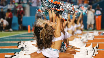MIAMI GARDENS, FL - DECEMBER 14: Miami Dolphins cheerleaders perform during the second half of the game against the New York Giants at Sun Life Stadium on December 14, 2015 in Miami Gardens, Florida. (Photo by Mike Ehrmann/Getty Images)