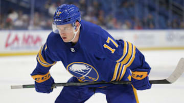 BUFFALO, NEW YORK - SEPTEMBER 27: Brandon Biro #17 of the Buffalo Sabres looks on during the first period against the Philadelphia Flyers at KeyBank Center on September 27, 2022 in Buffalo, New York. (Photo by Joshua Bessex/Getty Images)