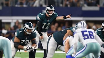Oct 30, 2016; Arlington, TX, USA; Philadelphia Eagles quarterback Carson Wentz (11) signals at the line of scrimmage against the Dallas Cowboys at AT&T Stadium. Mandatory Credit: Matthew Emmons-USA TODAY Sports