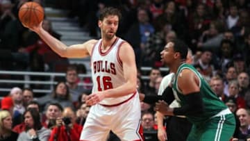 Jan 3, 2015; Chicago, IL, USA; Chicago Bulls forward Pau Gasol (16) is defended by Boston Celtics forward Jared Sullinger (7) during the second quarter at the United Center. Mandatory Credit: Dennis Wierzbicki-USA TODAY Sports
