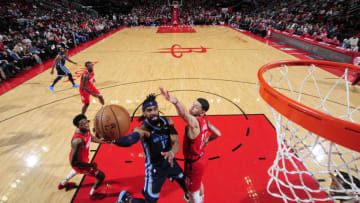 HOUSTON, TX - DECEMBER 31: Mike Conley #11 of the Memphis Grizzlies shoots the ball during the game against the Houston Rockets on December 31, 2018 at the Toyota Center in Houston, Texas. NOTE TO USER: User expressly acknowledges and agrees that, by downloading and or using this photograph, User is consenting to the terms and conditions of the Getty Images License Agreement. Mandatory Copyright Notice: Copyright 2018 NBAE (Photo by Bill Baptist/NBAE via Getty Images)