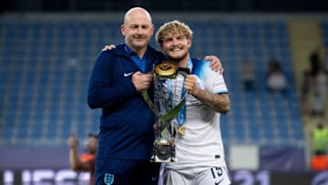 BATUMI, GEORGIA - JULY 8: Head coach Lee Carsley and Harvey Elliott of England celebrate with trophy during the UEFA Under-21 Euro 2023 final match between England and Spain on July 8, 2023 on Batumi Arena in Batumi, Georgia. (Photo by Sebastian Frej/MB Media/Getty Images)