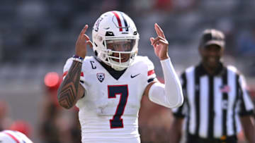 Sep 3, 2022; San Diego, California, USA; Arizona Wildcats quarterback Jayden de Laura (7) gestures at the line of scrimmage during the second half against the San Diego State Aztecs at Snapdragon Stadium. Mandatory Credit: Orlando Ramirez-USA TODAY Sports