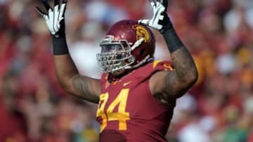 Nov 29, 2014; Los Angeles, CA, USA; Southern California Trojans defensive end Leonard Williams (94) celebrates against the Notre Dame Fighting Irish at Los Angeles Memorial Coliseum. Mandatory Credit: Kirby Lee-USA TODAY Sports