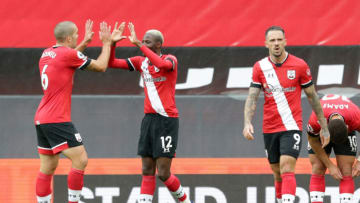 SOUTHAMPTON, ENGLAND - OCTOBER 04: Moussa Djenepo of Southampton is congratulated by team-mate Oriol Romeu after he scores a goal to make it 1-0 during the Premier League match between Southampton and West Bromwich Albion at St Mary's Stadium on October 04, 2020 in Southampton, England. Sporting stadiums around the UK remain under strict restrictions due to the Coronavirus Pandemic as Government social distancing laws prohibit fans inside venues resulting in games being played behind closed doors. (Photo by Robin Jones/Getty Images)