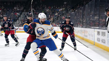 COLUMBUS, OHIO - OCTOBER 04: Kirill Marchenko #86 of the Columbus Blue Jackets and Alex Tuch #89 of the Buffalo Sabres battle for the puck during the third period at Nationwide Arena on October 04, 2023 in Columbus, Ohio. (Photo by Jason Mowry/Getty Images)